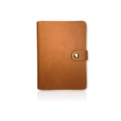 Brown Individual Airtag Passport Holder crafted from high-quality leather, featuring RFID protection and multiple slots for cards and passport.